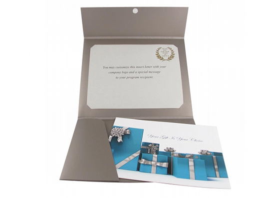 Metallic presentation folder holding a certificate and gift booklet